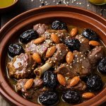 Tajine d'agneau aux pruneaux, amandes et miel : recette savoureuse
